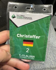 Konferenzausweis der TTK University of Applied Sciences in Tallinn mit Namen und deutscher Flagge